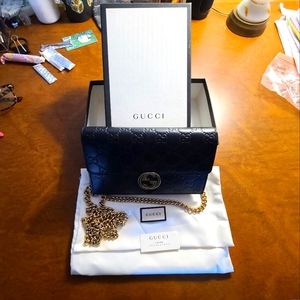 Gucci crossbody logo leather interlocking gg